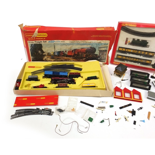 1335 - Hornby OO gauge model railway trains, track and accessories including R506 Freight set