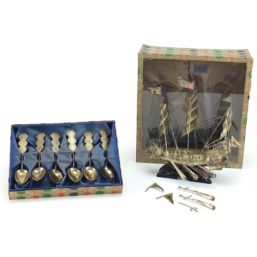 2230 - Chinese white metal model junk and set of six teaspoons, both with fitted display cases, the largest... 