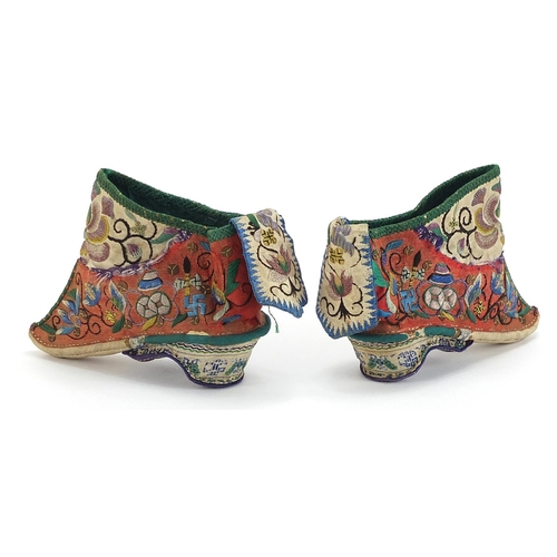 291 - Pair of Chinese silk lotus shoes embroidered with flowers, each 11cm in length