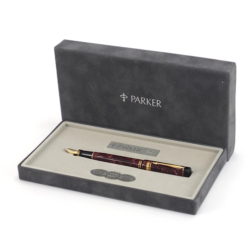 101 - Parker red marbleised fountain pen with 18k gold nib and case