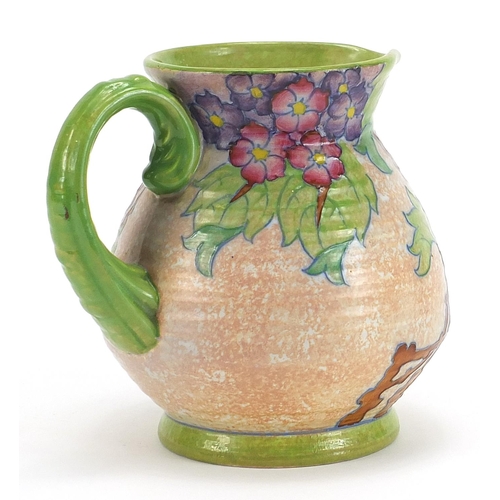 457 - Charlotte Rhead for Crown Ducal, Art Deco pottery jug hand painted with flowers, 16cm high