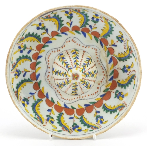 194 - Turkish Kutahya pottery lemon squeezer, 18cm in diameter