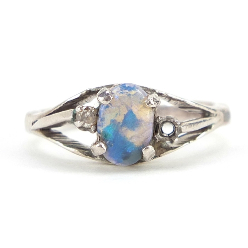 2058 - Unmarked white metal cabochon opal and diamond ring, size K, 2.8g