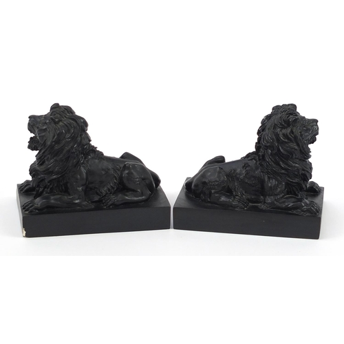 1304 - Pair of decorative bronzed HSBC sculptural bookends of lions incised Wagstaff Sculptor 1935, with bo... 