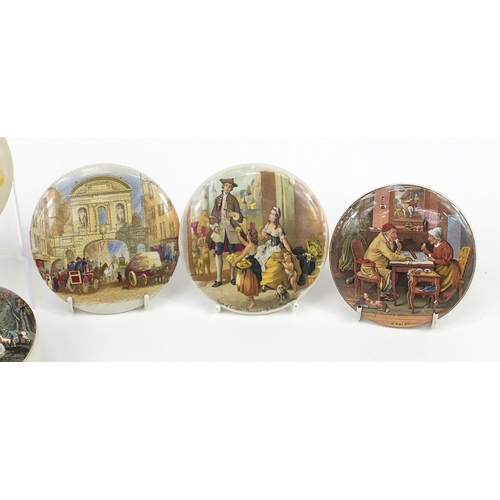 1204 - Selection of Prattware style pot lids including one titled The Enthusiast, the largest 10cm in diame... 