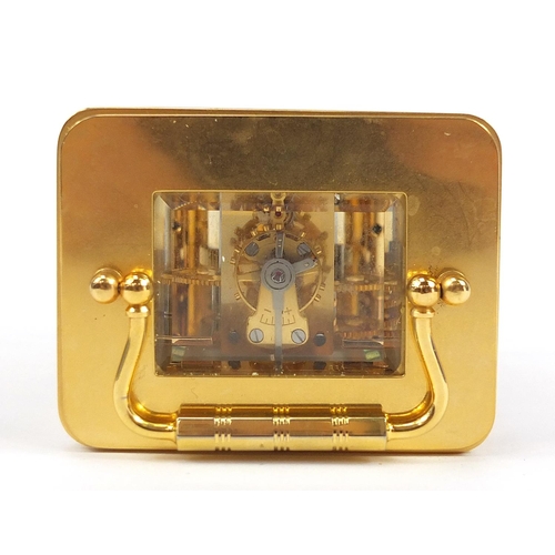 407 - Garrard & Co, brass cased carriage clock having Roman numerals with box and valuation, the carriage ... 