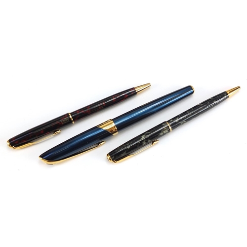 106 - Three Parker ballpoint pens with cases and boxes comprising two Sonnet and one Ellipse