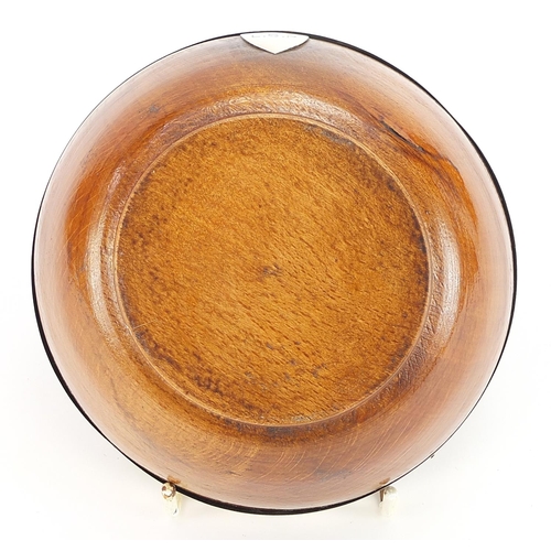 675 - Treen bowl with silver rim, indistinctly hallmarked Chester, 13.5cm in diameter