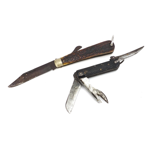 2338 - Two folding knives/multi tools including a hunting example with stag horn handle, the largest 23cm i... 