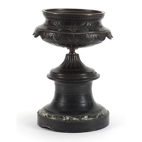 387 - 19th century Grand Tour patinated bronze urn with a circular marble base, 20.5cm high