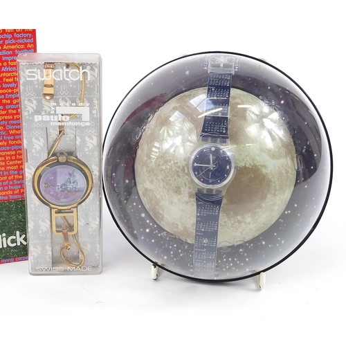 2188 - Swatch, six Swatch Collector's Club wristwatches with boxes and cases including The Moon, Batman and... 