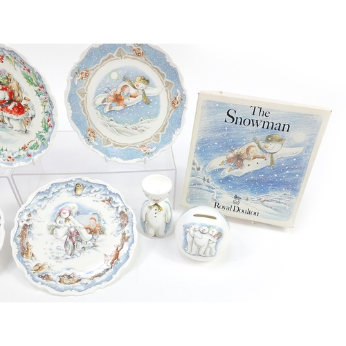 547 - Royal Doulton The Snowman gift collection including plates and money box, two with boxes, the larges... 