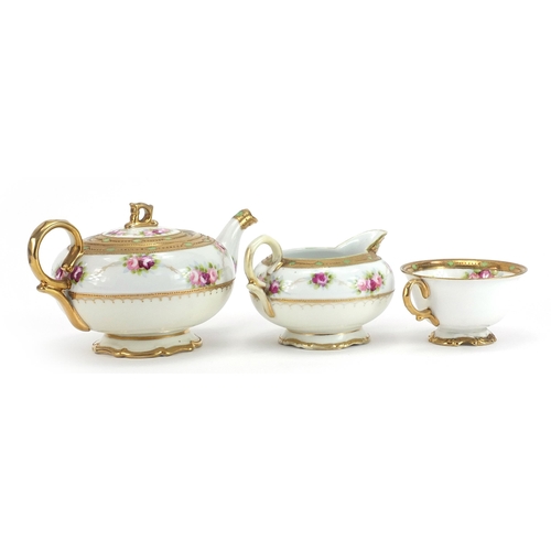 623 - Noritake part tea for one decorated with roses, the teapot 19.5cm in length