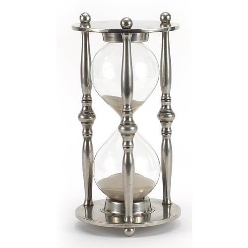 718 - Silver plated hour glass timer, 25cm high