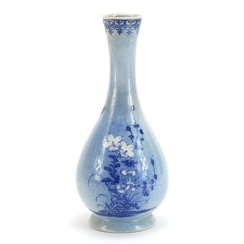 1055 - Japanese blue and white porcelain vase hand painted with flowers, six figure character marks to the ... 