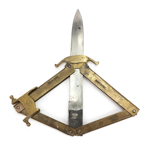 393 - Military interest steel bladed folding knife with brass handle, 24.5cm in length when open