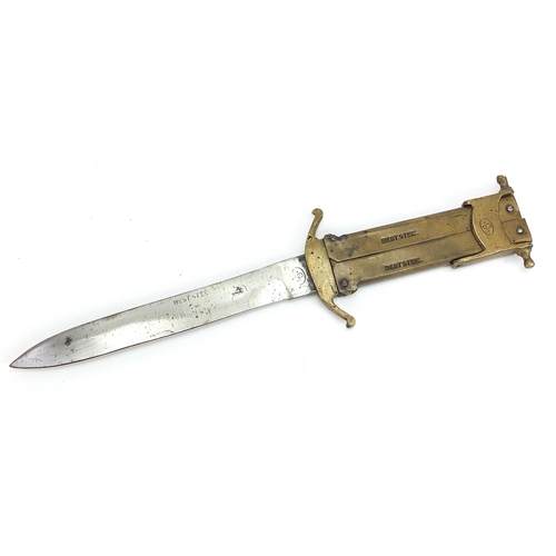 393 - Military interest steel bladed folding knife with brass handle, 24.5cm in length when open