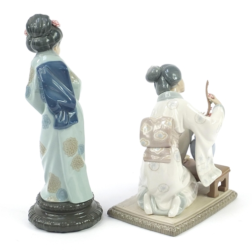 564 - Two Lladro porcelain Geisha girl figurines, the largest 26.5cm high