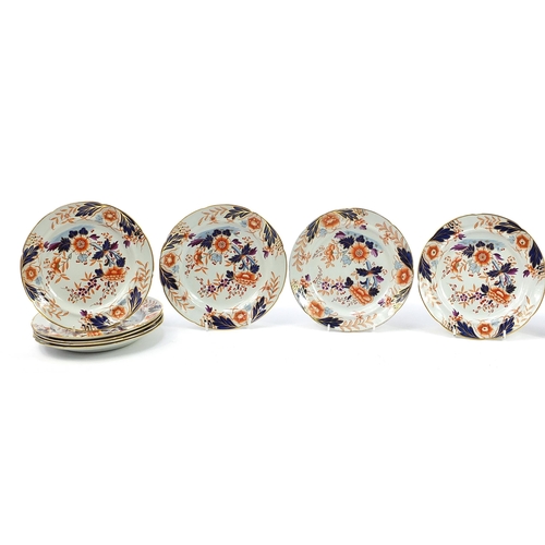 211 - Fourteen Davenport Imari pattern stone china plates hand painted and gilded with flowers, 22cm in di... 