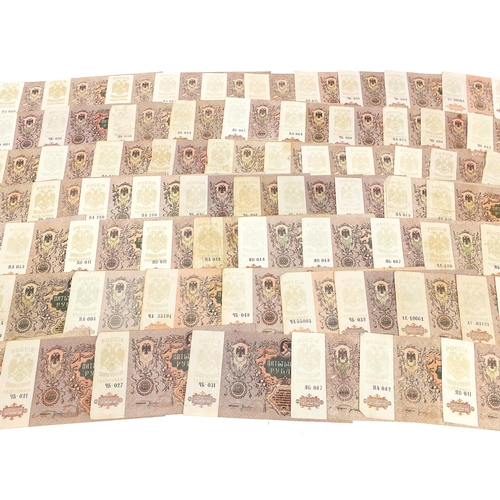 1616 - Large collection of approximately one hundred Russian 1919 five thousand rouble banknotes