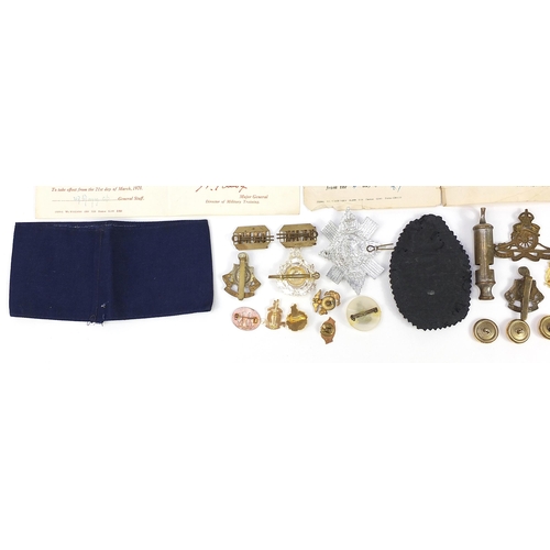 2318 - Militaria including Regular Army Service certificate, WVS armband, cap badges, cloth patches and whi... 