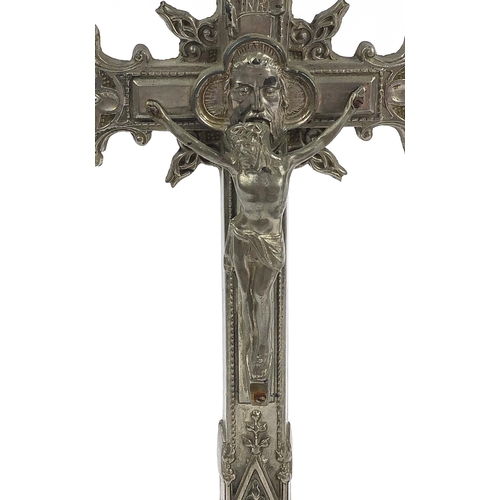 1059 - Two religious interest altar crucifixes including a ebonised carved wood example, the largest 54cm h... 