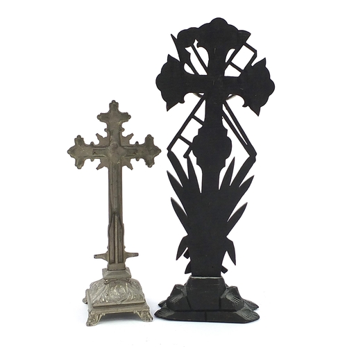 1059 - Two religious interest altar crucifixes including a ebonised carved wood example, the largest 54cm h... 