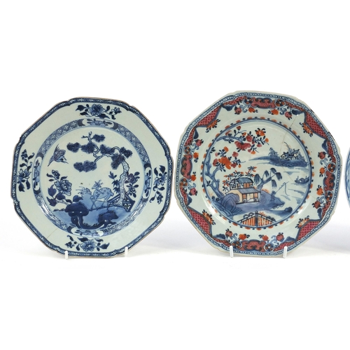 487 - Two Chinese porcelain plates and a blue and white porcelain soup bowl hand painted with flowers, the... 