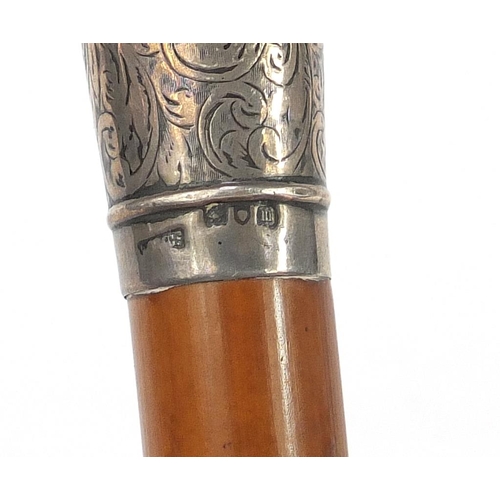 1310 - Malacca walking stick with engraved silver pommel, London hallmarks, 85cm in length