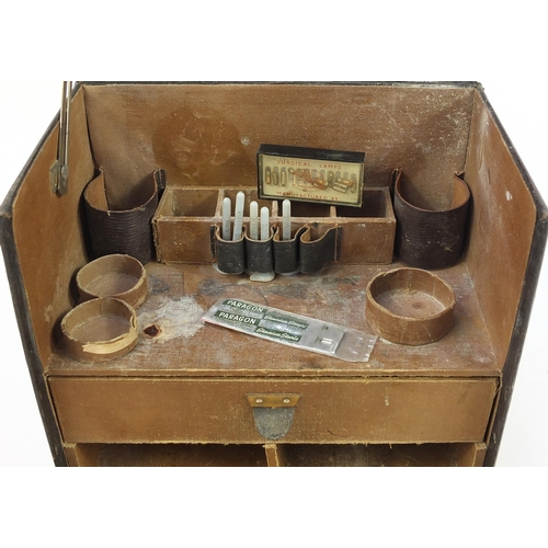 395 - Vintage leather doctor's travelling medical case with various implements, lift up top and fold down ... 