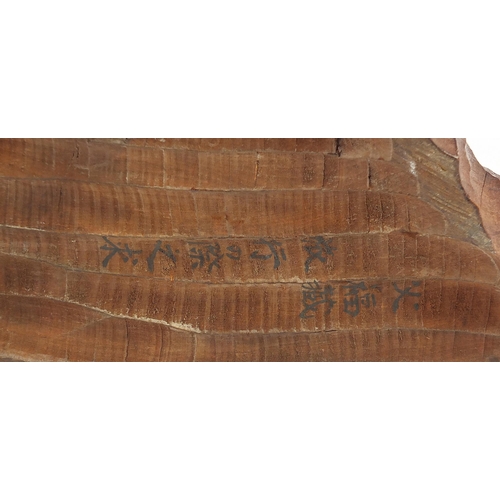52 - Large Black Forest carving of a bear with fish, incised Chinese character marks to the reverse, 31.5... 