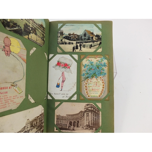 1510 - Topographical greetings and comical postcards arranged in an album including Donald McGill, street s... 