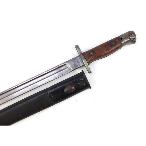 2362 - British military bayonet with scabbard and steel blade impressed Sanderson, 57.5cm in length