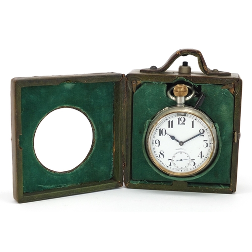 409 - Goliath pocket watch housed in a tooled leather travel case, the pocket watch patent number 10292