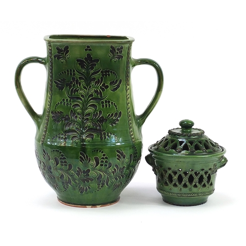 604 - Hungarian folk art vase with twin handles and pierced bowl with cover, the vase incised with stylise... 