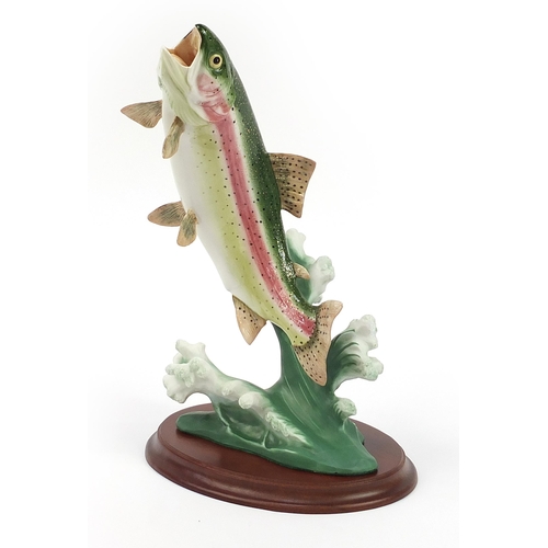 725 - Franklin mint porcelain Defiance on wooden plinth base by Al Agnew, overall 35cm high