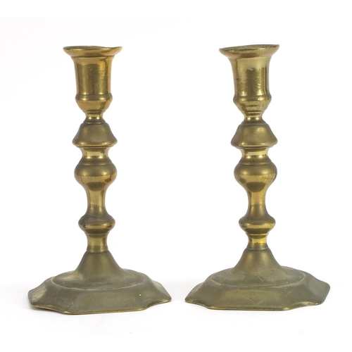 394 - Pair of 18th century turned brass candlesticks, each 17.5cm high