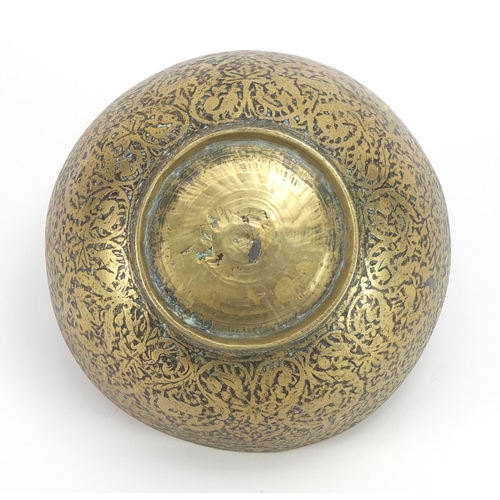 1083 - Islamic brass bowl engraved with wild animals and calligraphy, 14cm in diameter