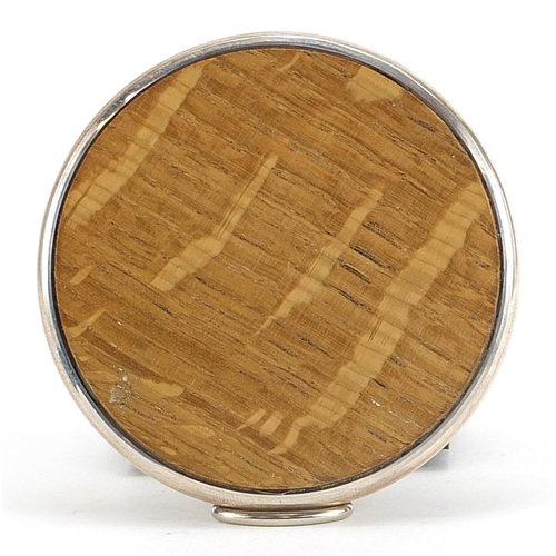 2254 - Simon J Beer, Elizabeth II circular silver and oak coaster, Sheffield 2000, 7cm in diameter, 72.0g