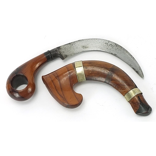 392 - Unusual curved knife with steel blade and hardwood sheath, 17.5cm in length