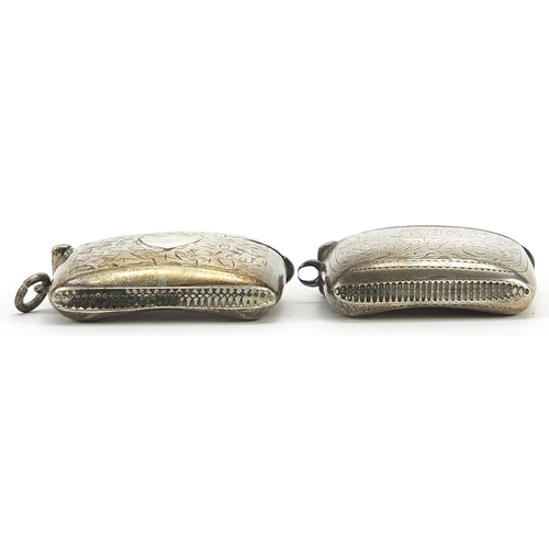 2253 - Two Edwardian silver vestas with engraved decoration, Birmingham 1906 and 1907, the largest 5cm high... 