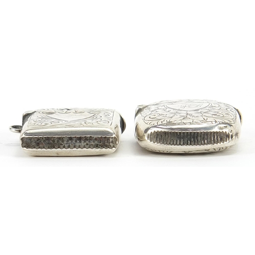 2259 - Two Victorian and later silver vestas with engraved decoration, Birmingham 1892 and 1906, the larges... 