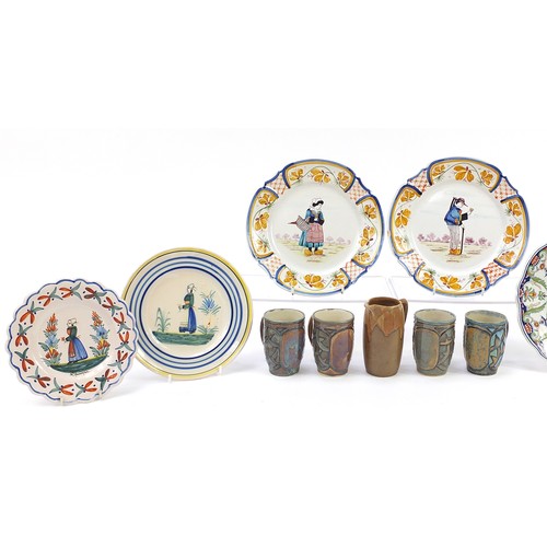 495 - French faience glazed pottery including Quimper plates and a Fourmain Evaux Desvres plate hand paint... 