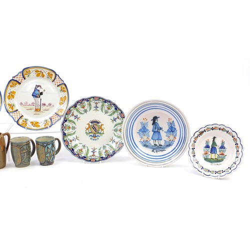 495 - French faience glazed pottery including Quimper plates and a Fourmain Evaux Desvres plate hand paint... 