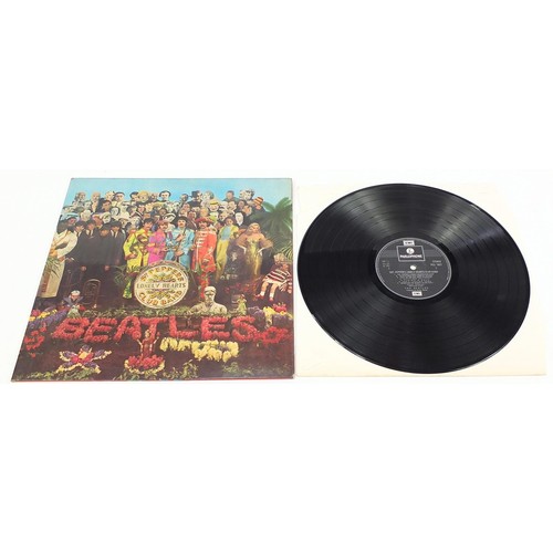 1387 - Five Sgt Pepper's Lonely Hearts Club Band vinyl LP records by The Beatles with cut outs, three stere... 