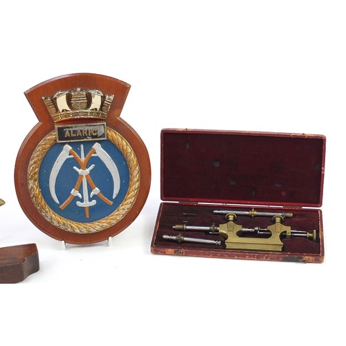 686 - Sundry items including a naval interest cast metal Alaric plaque, mahogany and metal spirit level an... 