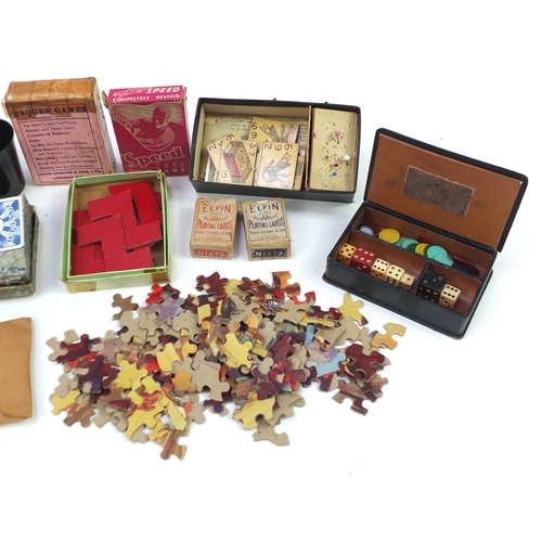 1368 - Collection of vintage toys including playing cards, dice shakers, puzzles, games and counters