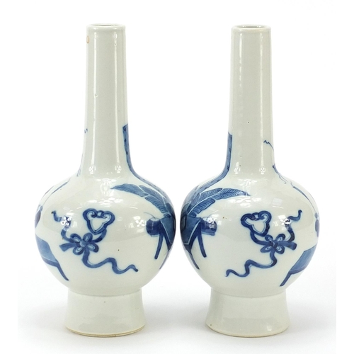 113 - Pair of Chinese blue and white porcelain vases hand painted with figures and Daoist emblems, Kangxi ... 