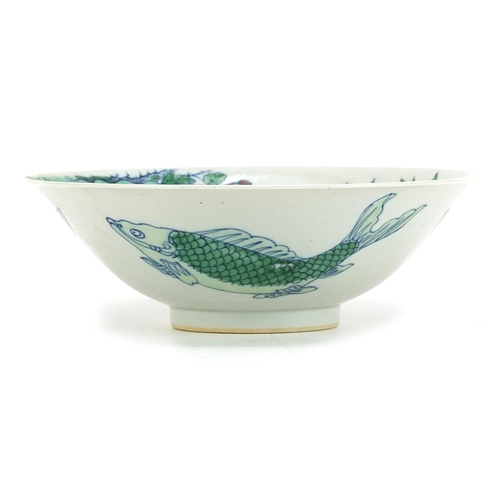 366 - Chinese porcelain doucai bowl hand painted with a bird on a branch amongst butterflies and fish, six... 