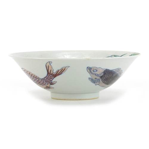 366 - Chinese porcelain doucai bowl hand painted with a bird on a branch amongst butterflies and fish, six... 